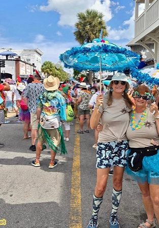 Jennifer and a friend at the "Just A Few Friends" Second Line Parade in Key West.