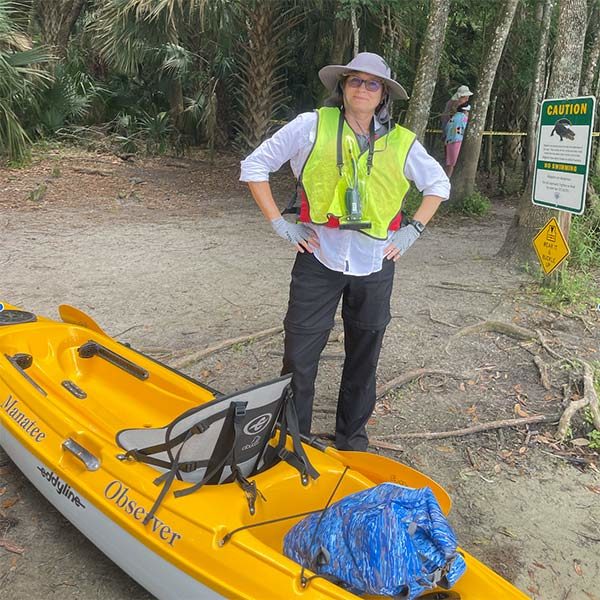 SMC Volunteer Anna Elias at Blue Spring State Park with a Manatee Observer kayak.